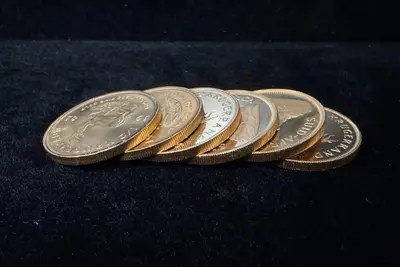 A fanned row of gold Krugerrand coins